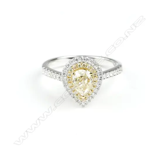 An 18ct. white gold and diamond combination pendant/ring