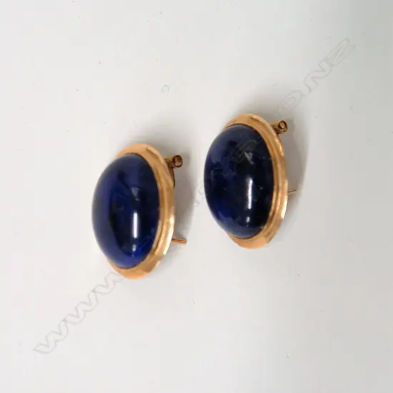 A pair of 14ct. yellow gold and deep blue stone earrings