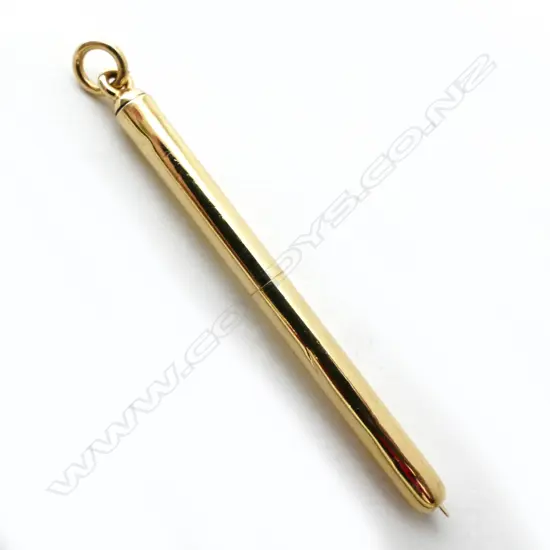 A retractable 14ct. gold toothpick