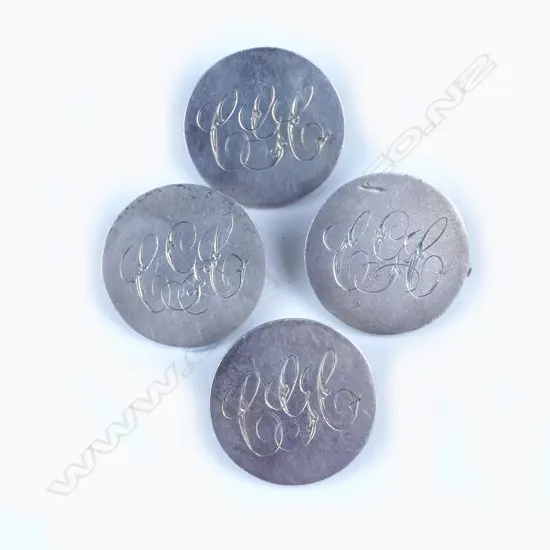 Four silver Peterson & Co. golf buttons