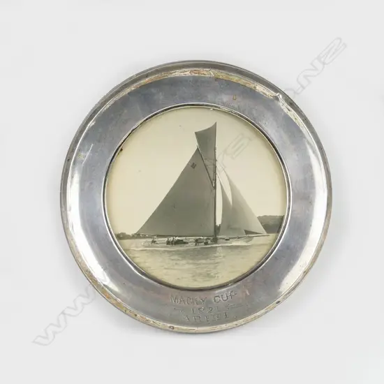 A silver trophy photo frame