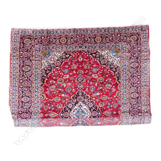 A large Kashan carpet