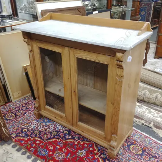 An Edwardian pine cabinet