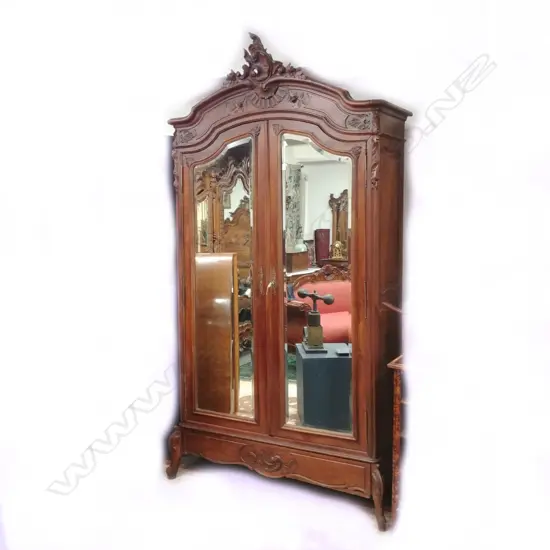 A 19thC French walnut armoire