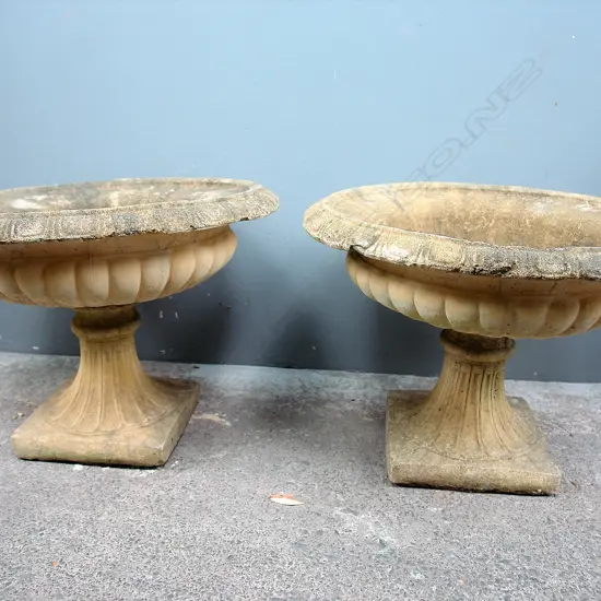 A pair of church stone classical garden urns