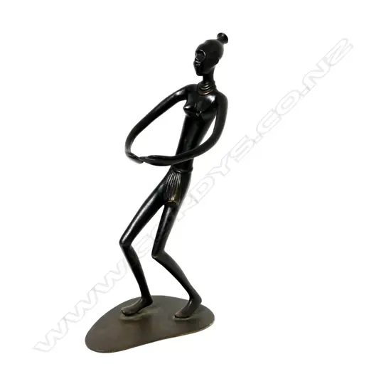 A small Richard Rohac (Austria 1906-1956) bronze figure of a crouching African woman