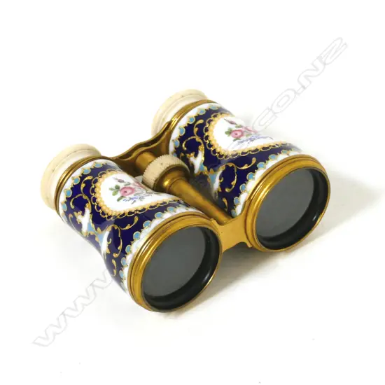 A pair of French 19thC porcelain and ivory opera glasses