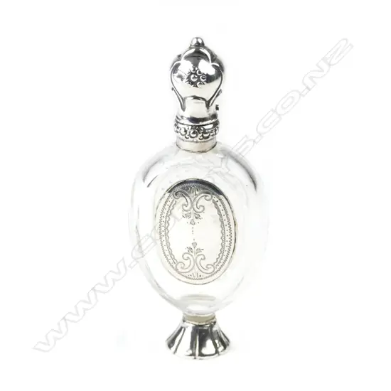 A Continental silver and glass scent bottle