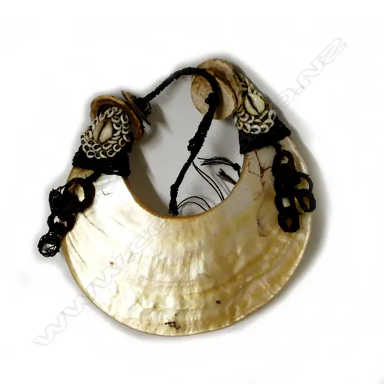 A Papua New Guinea pearl shell crescent breast plate