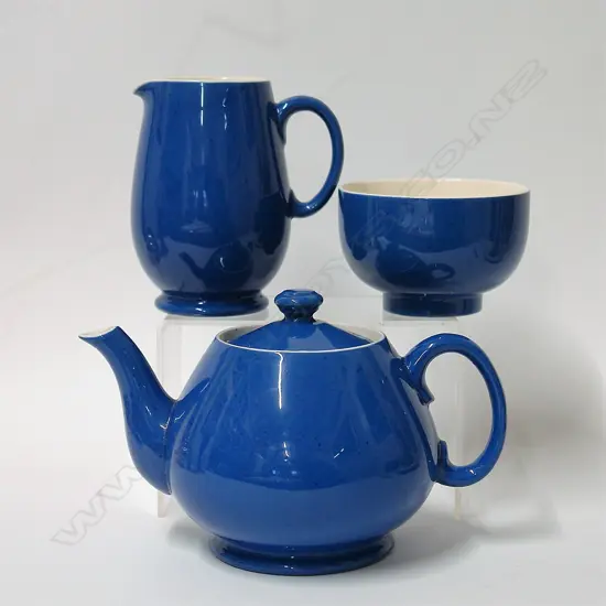 A William Moorcroft 'Powder Blue' three-piece tea set