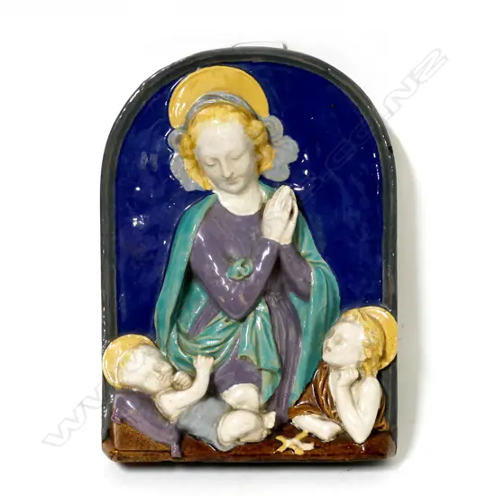 An Italian majolica Madonna with child and angel wall hanging