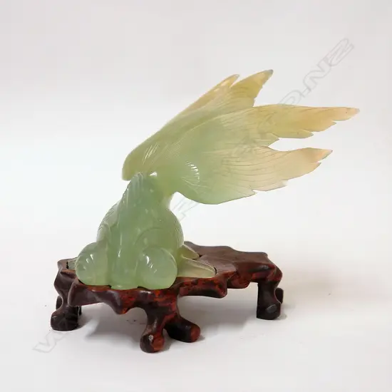 A Chinese carved jade dragon eye fish