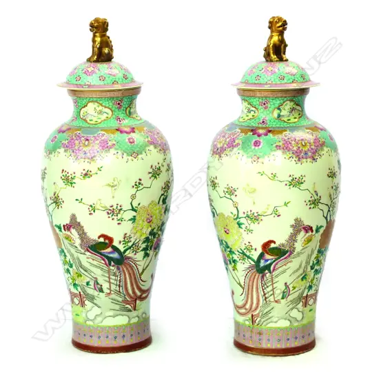 A pair of famille rose lidded floor vases