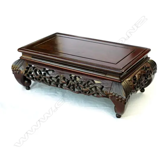 A small low Chinese hardwood vase stand