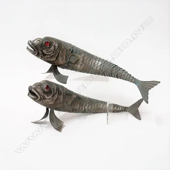 A pair of vintage large (coin silver) articulated fish ornaments