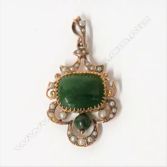 An Edwardian 9ct. yellow gold greenstone and seed pearl pendant