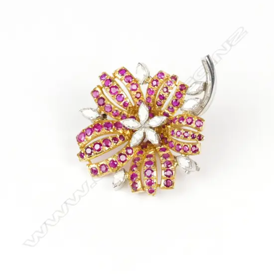 A vintage 18ct. yellow gold ruby and diamond flowerhead brooch