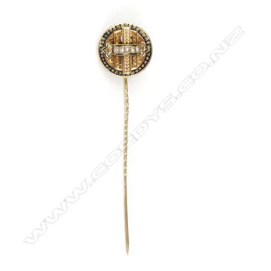 An early 20thC 9ct. gold and seed pearl fancy stick pin