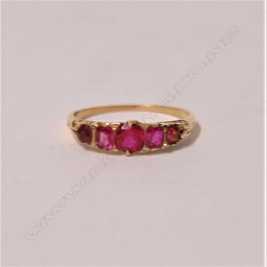 A c.1900 18ct. yellow gold and ruby bridge type ring