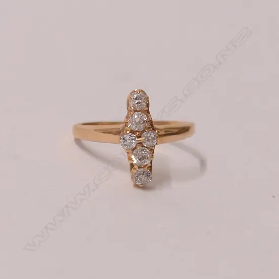 A lady's estate 18ct. yellow gold and diamond set ring