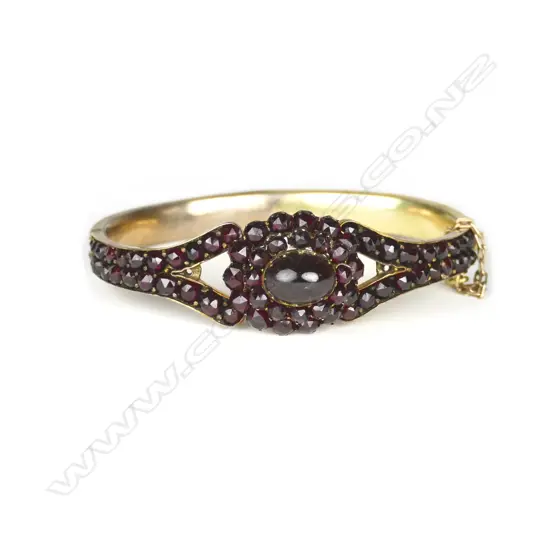 A vintage Bohemian garnet hinged bangle