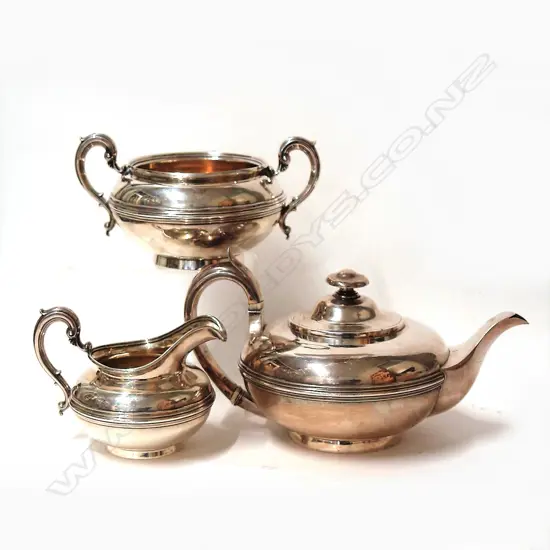An early 19thC composite three piece heavy silver tea set