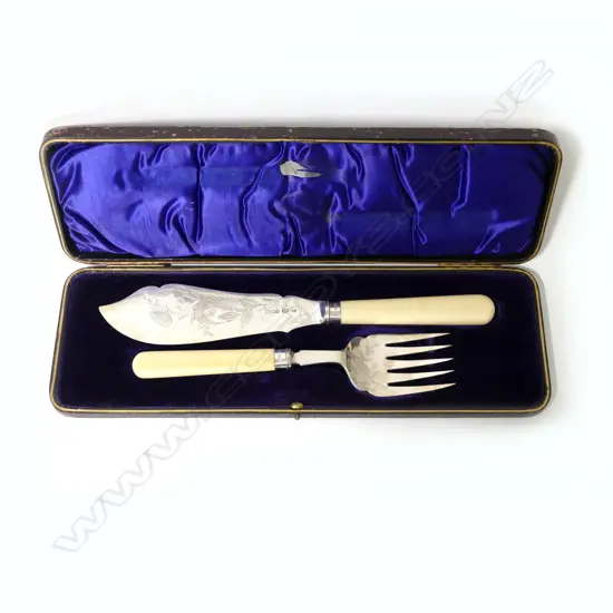 A pair of late Victorian silver and ivory handled fish servers