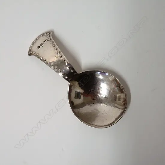 A late Victorian Arts & Crafts Keswick School tea caddy spoon