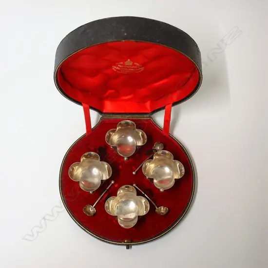 A cased set of four Victorian silver salts with spoons