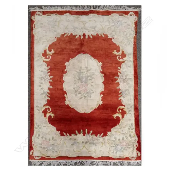 A hand knotted sculpted silk rug