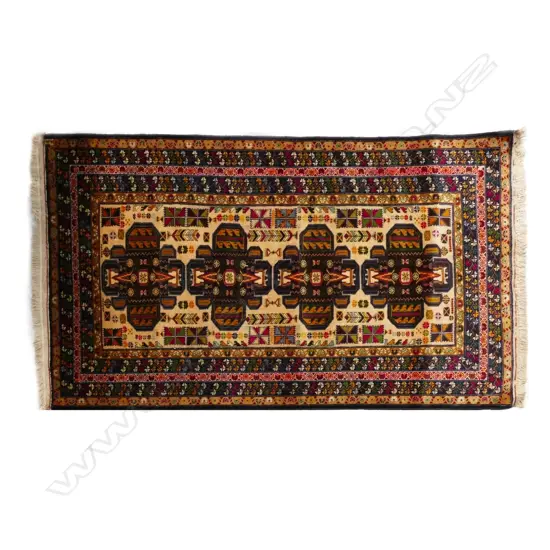 A vintage Baluchi rug