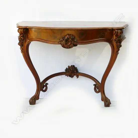 A flame mahogany console table