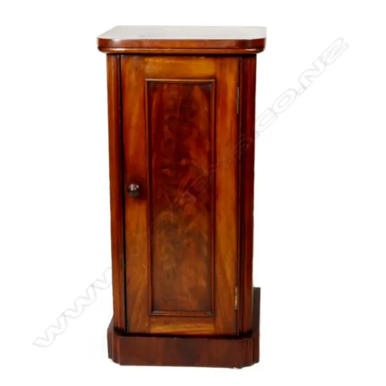 An elegant mahogany bedside cabinet