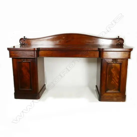 A William IV mahogany inverse breakfront sideboard