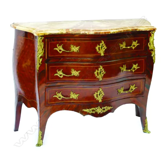 A French three-drawer bombé commode of rare cocobolo wood