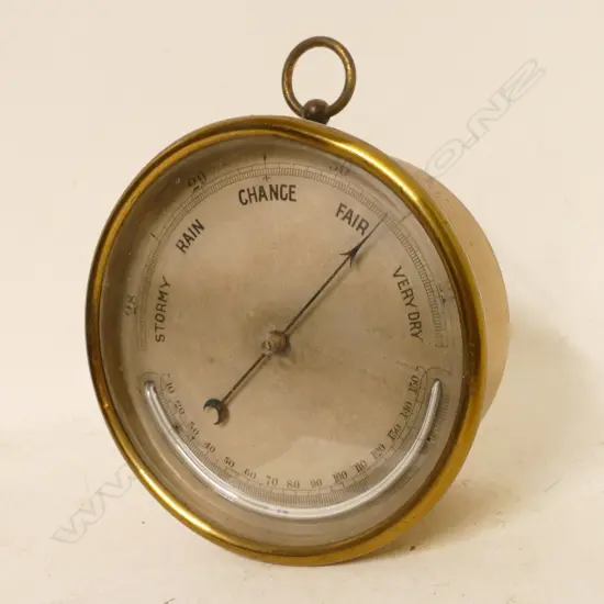 A brass cased aneroid barometer