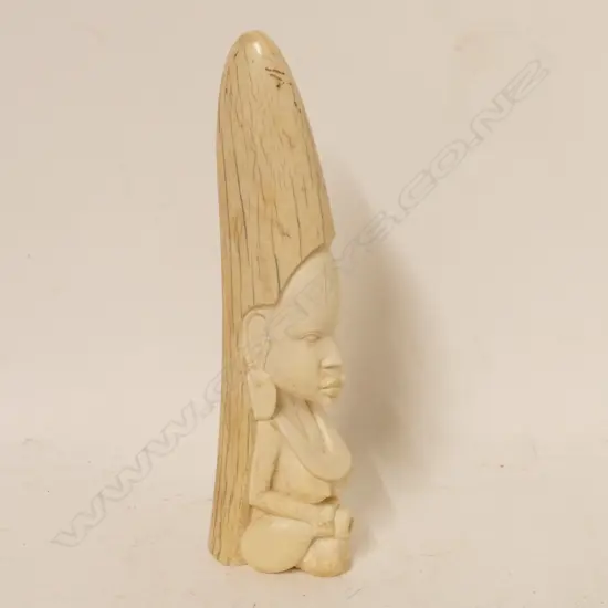 An African carved ivory tusk tip