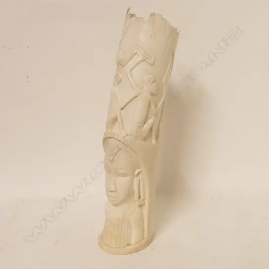 An African carved tusk vase