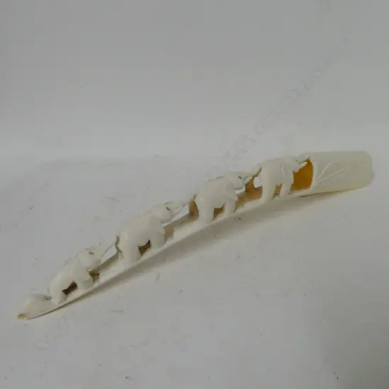 An African ivory carved tusk bridge