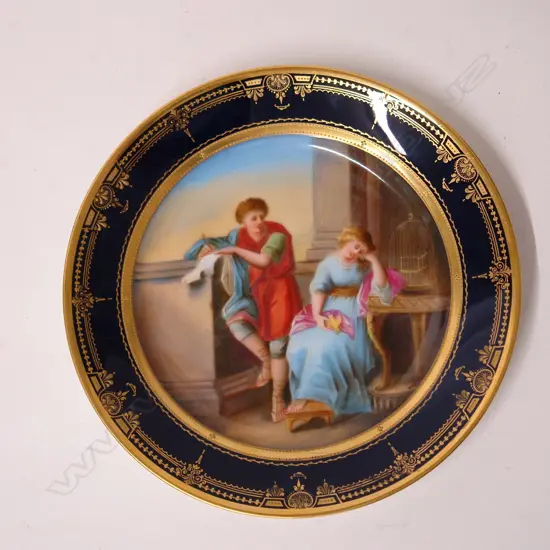 A Royal Vienna type hand painted porcelain vase of a young couple