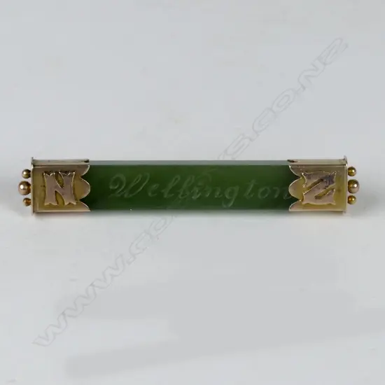A colonial 15ct. gold and greenstone bar brooch
