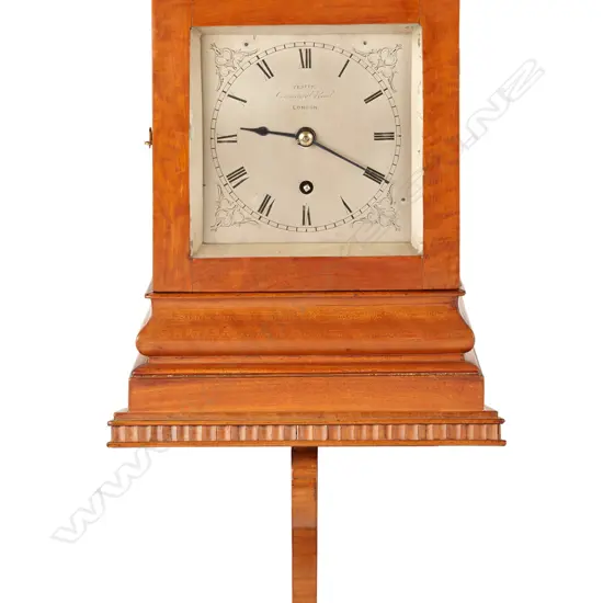 A small bracket timepiece in 5-glass satinwood case