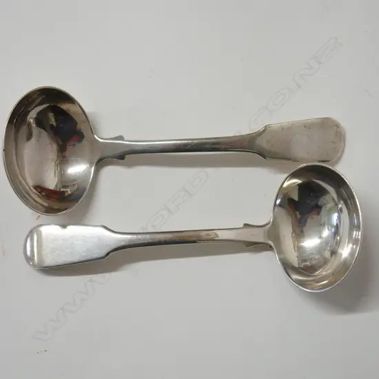 A pair of George III silver sauce ladles
