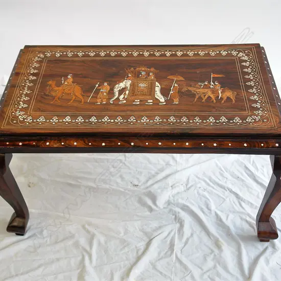 A vintage Indian rosewood inlaid side table