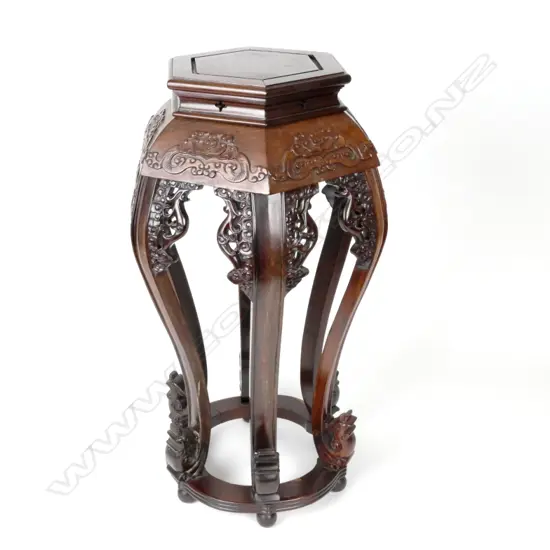 A Chinese rosewood hexagonal vase table
