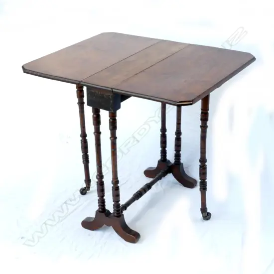A miniature late Victorian mahogany Sutherland table on turned supports. Width 540