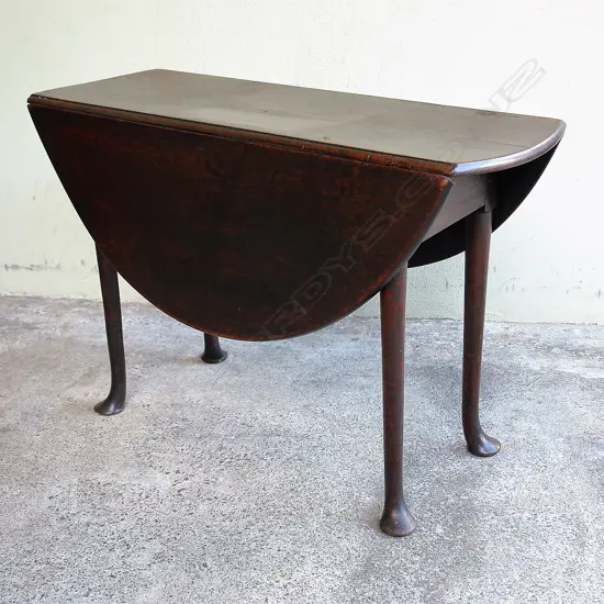 A George III mahogany drop-side gate-leg table