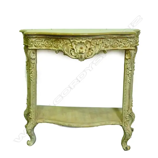 A small serpentine side table of French style