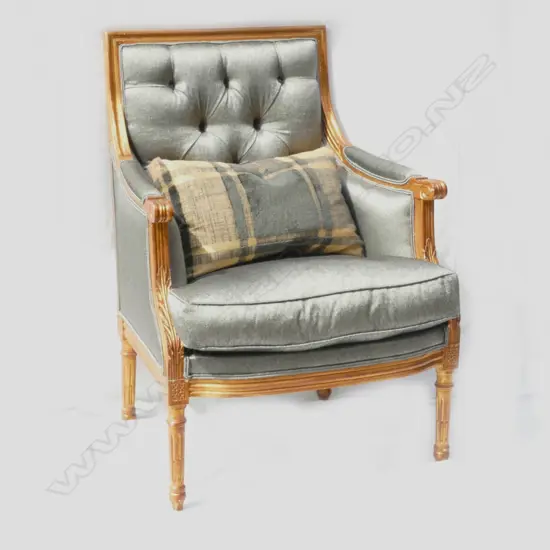 A pair of French style armchairs