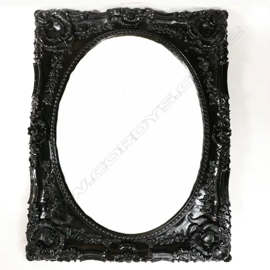 A large and decorative mirror